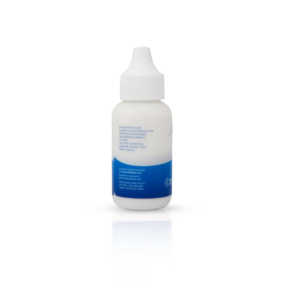 White bottle with blue label on a white background