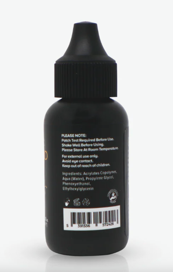Black bottle with label on a white background